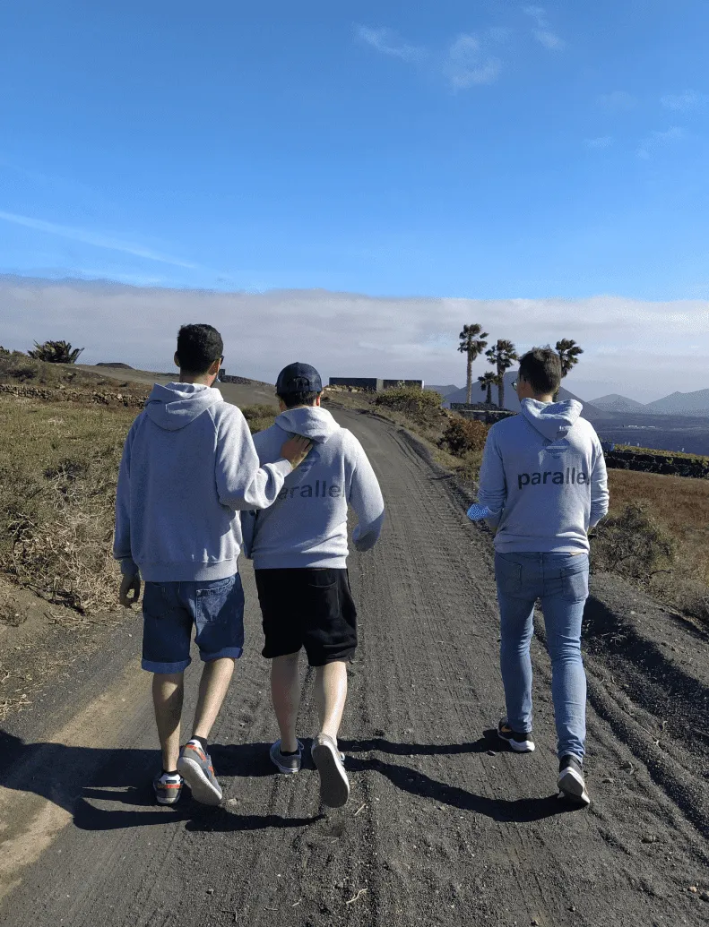 An image of the Parallel Co-Founders walking through Lanzarote